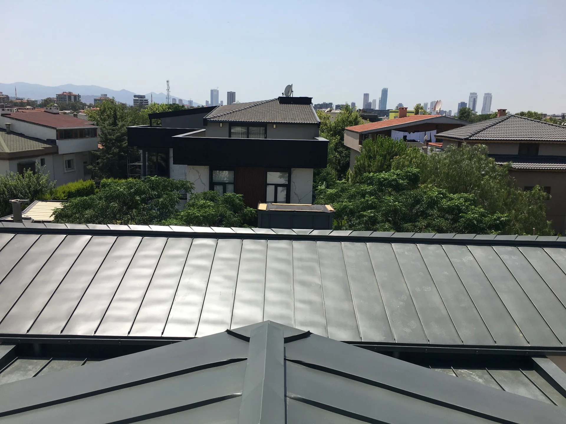 Completed standing seam roof surface