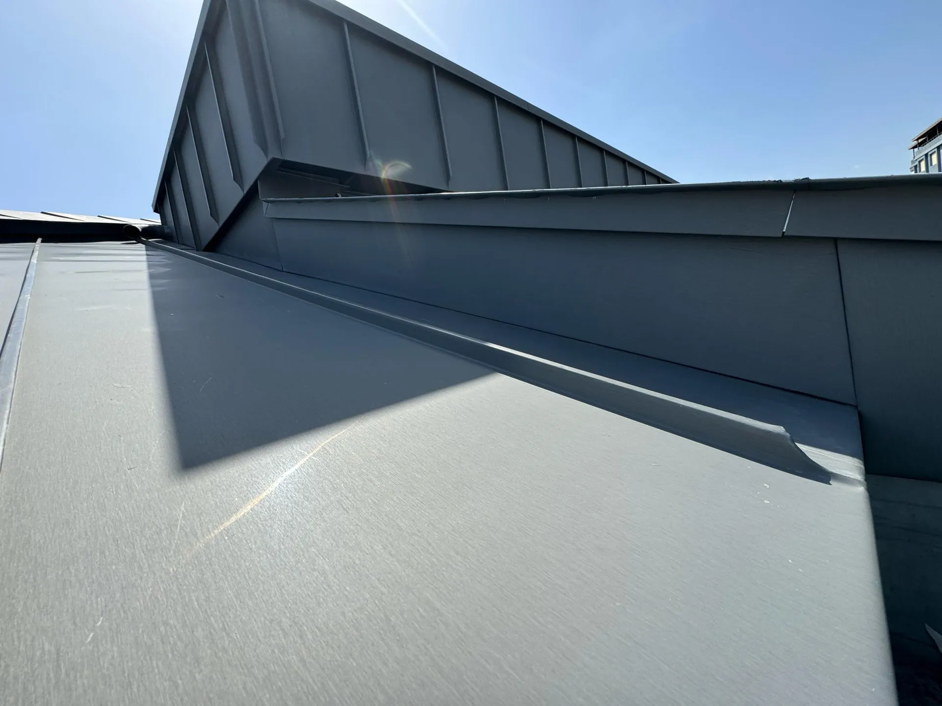 Standing seam roof wall-abutment detail