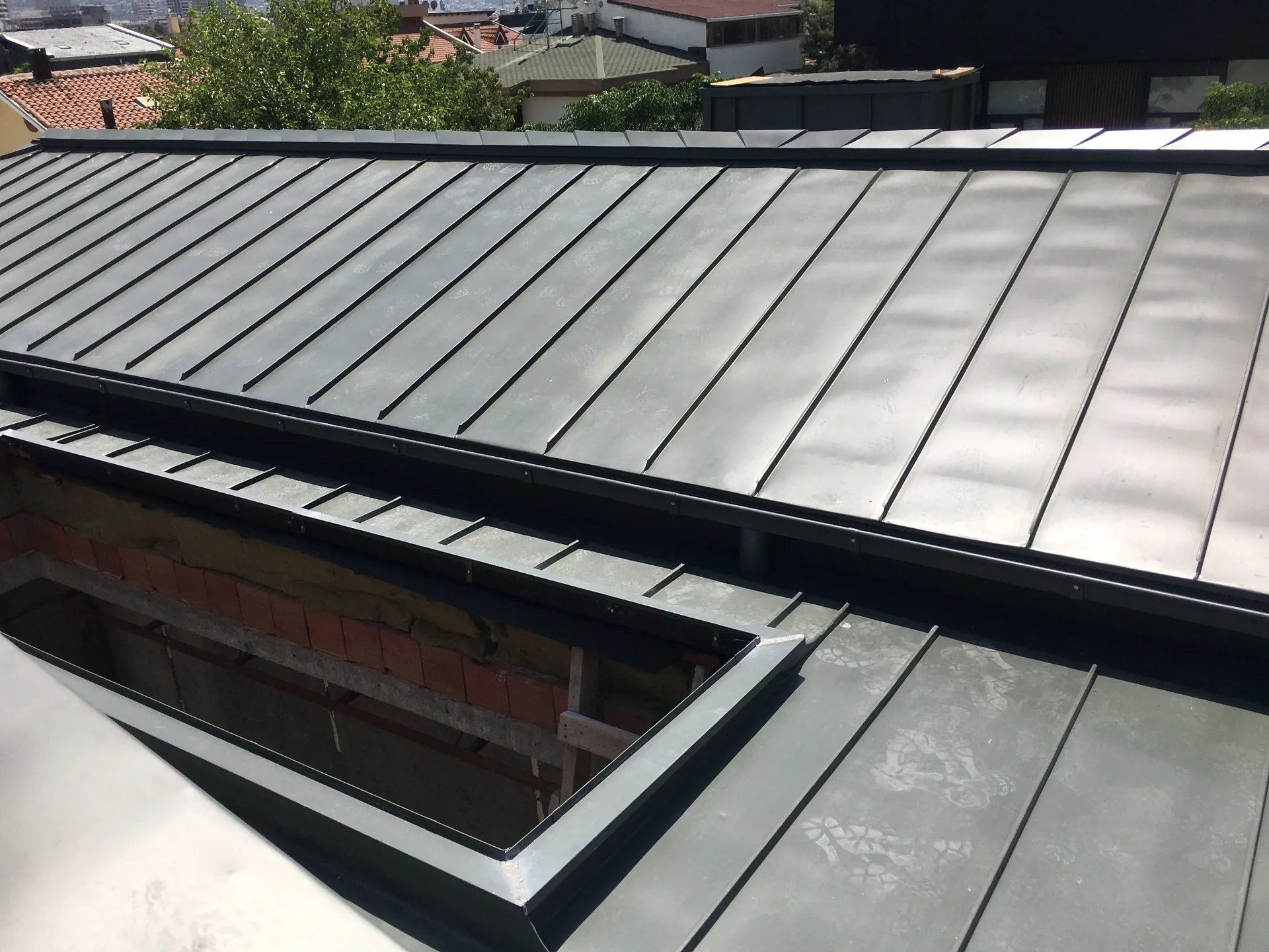 Completed standing seam metal roof installation