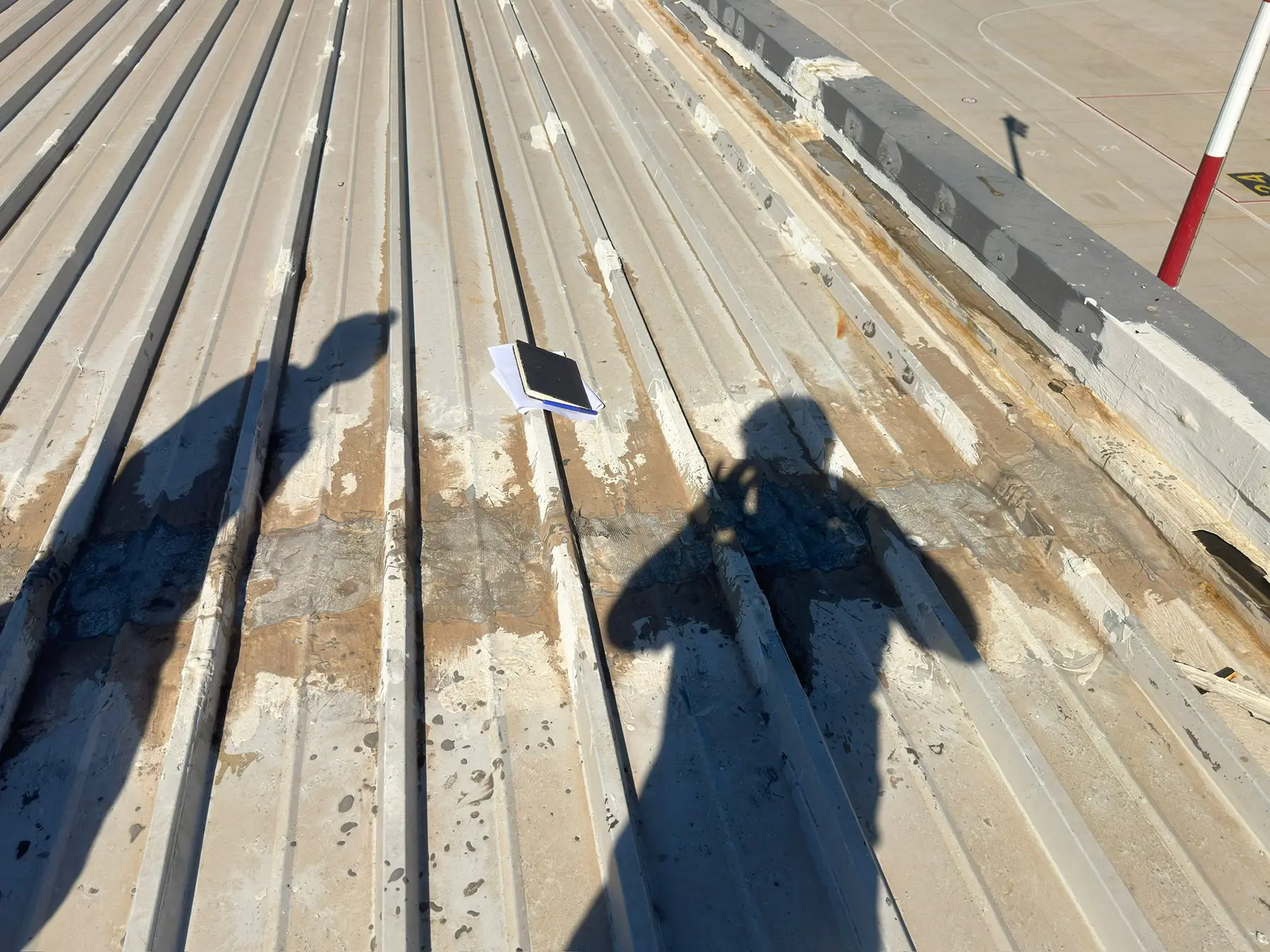 Condition and damage survey of an industrial metal roof