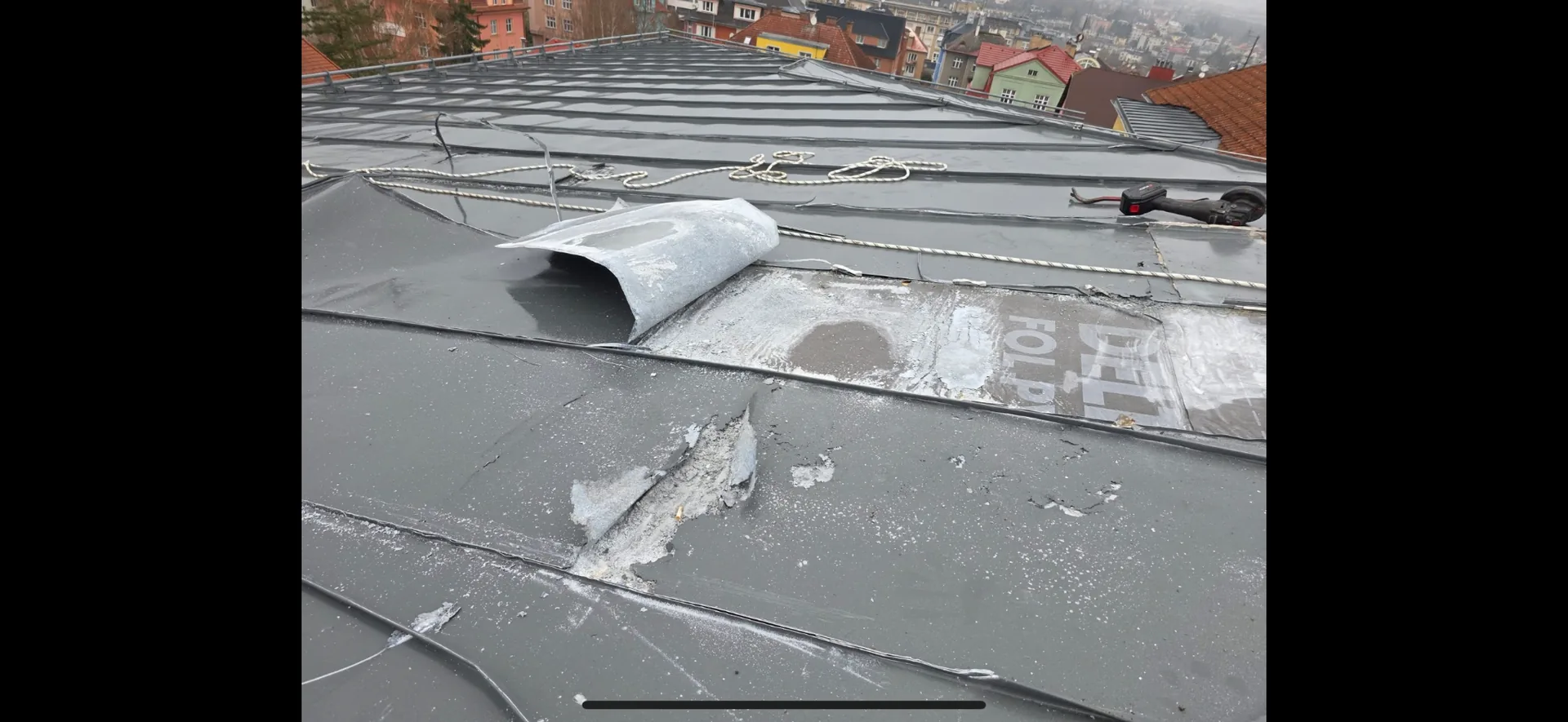 System defect exposed beneath removed roof covering