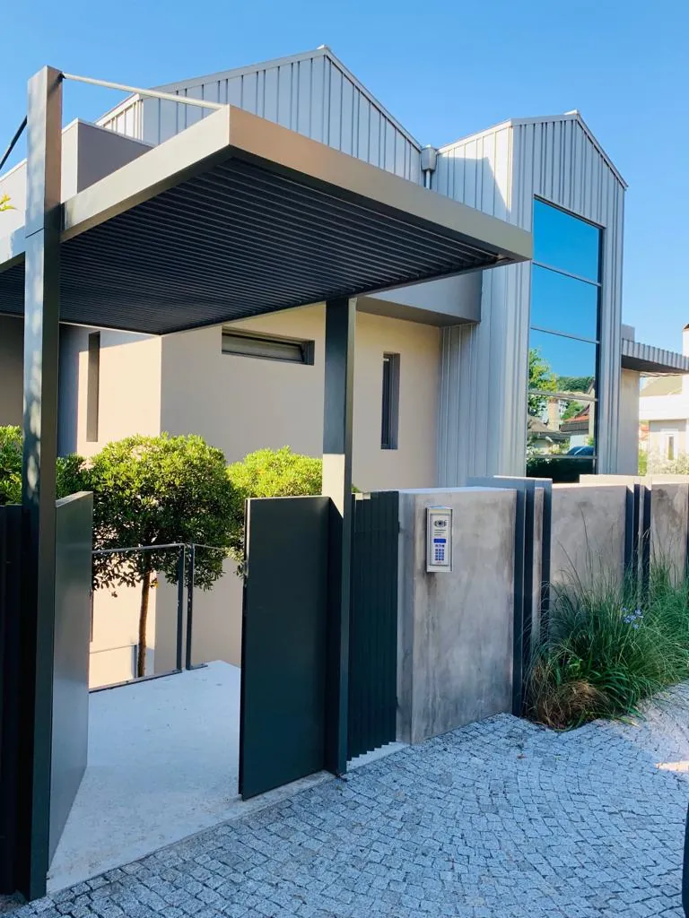 Titanium zinc standing seam roof and façade cladding on a contemporary residential building